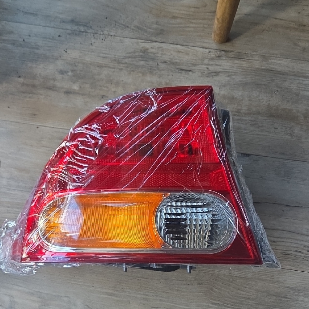 Red and Orange Car Tail Light